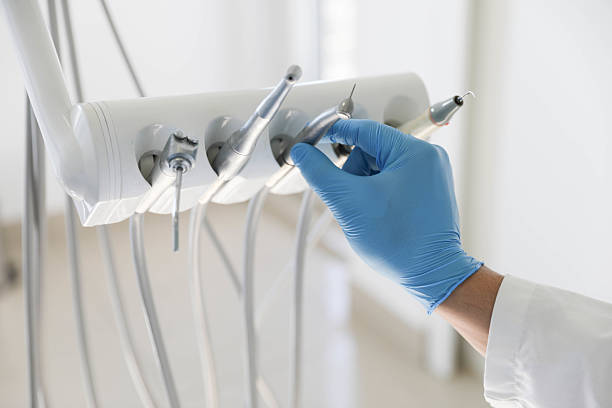 Professional Tooth Extraction technician working in Bridgeport, AL